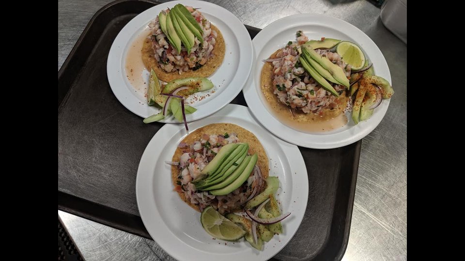 Colorful Mexican dishes served in a family-friendly dining room.