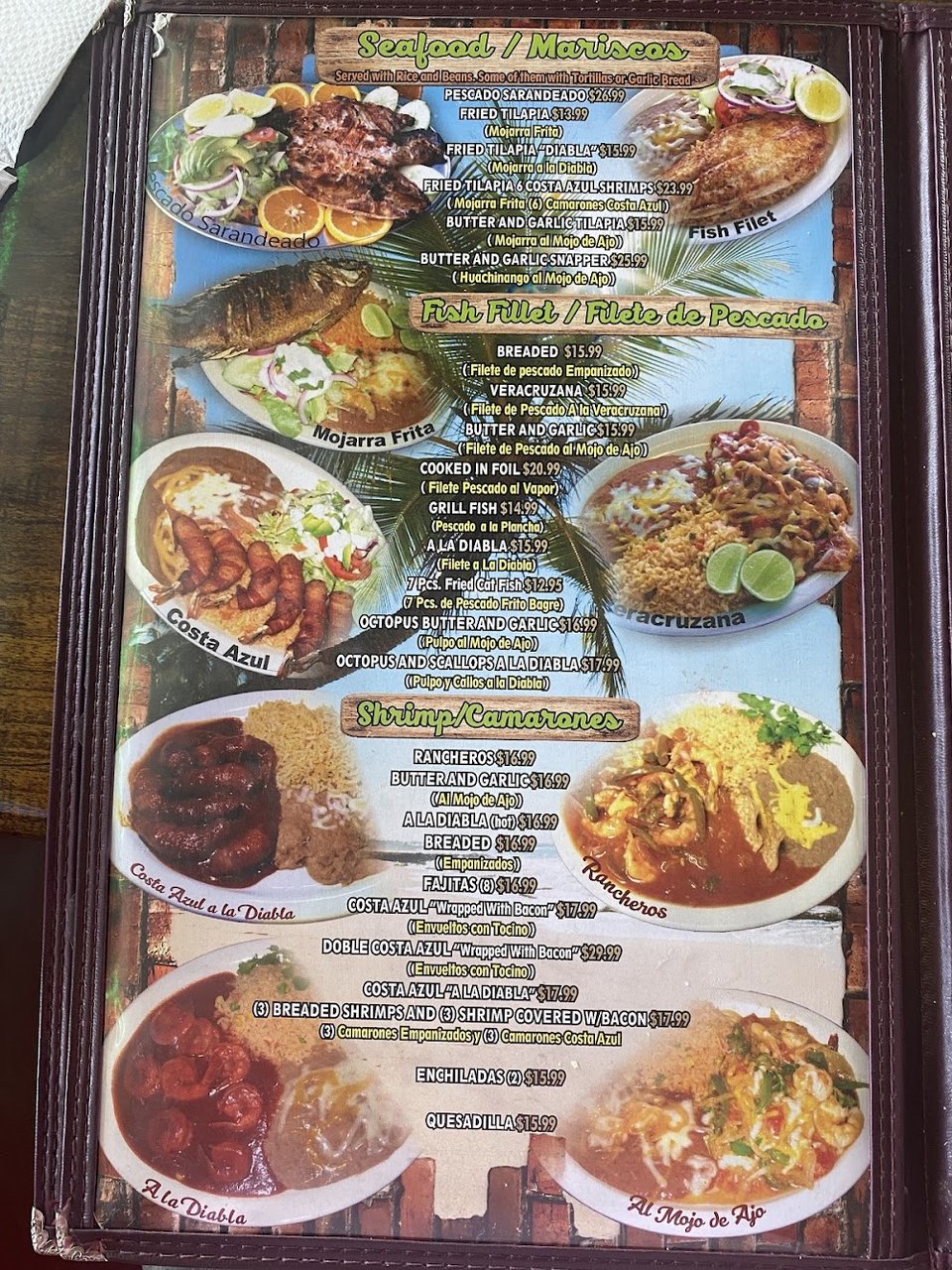 Printed menu page with seafood, burritos, and kids' meals.
